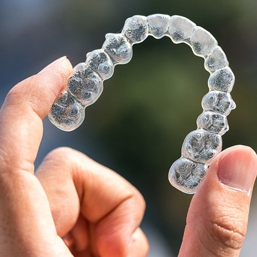 Holding an aligner for ClearCorrect in Lacey, WA