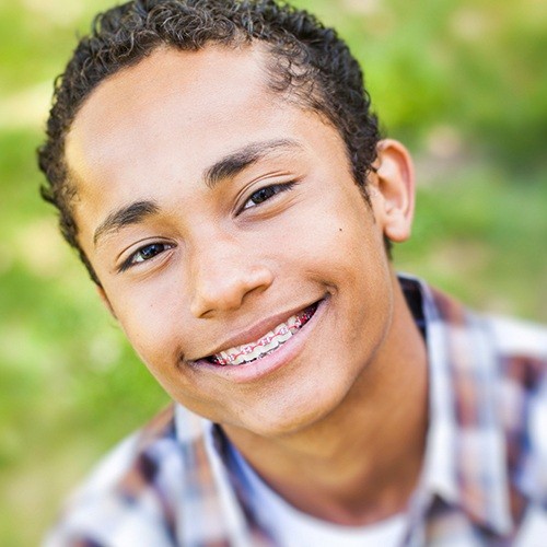 Teen with traditional braces