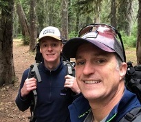 Doctor Cammack and family member on a hike