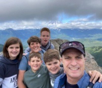 Doctor Cammack and his family outdoors