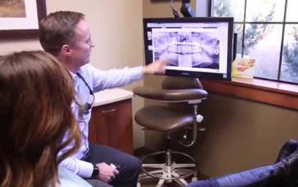 Lacey dentist showing a patient their dental x rays