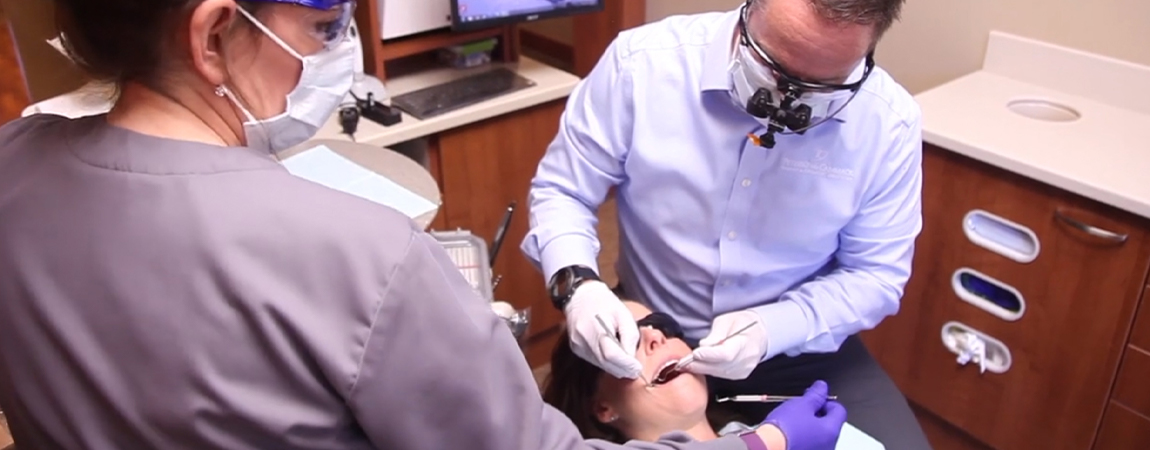 Lacey Washington dentist Spenser Cammack D D S treating dental patient