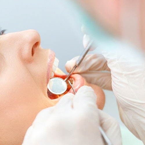 woman getting a dental crown in Lacey