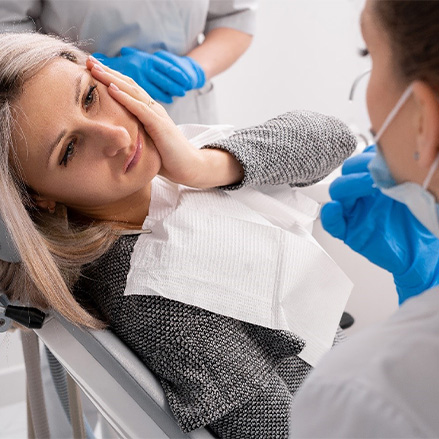 Implant dentist in Lacey speaking with a patient