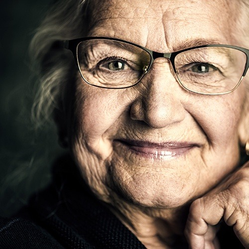 Woman with dentures smiling