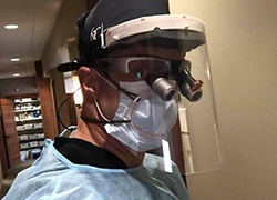 Dentist in Lacey wearing protective face mask