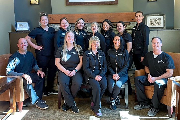 Dentists and dental team members smiling in Lacey dental office