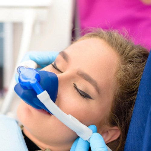 female patient getting nitrous oxide sedation 