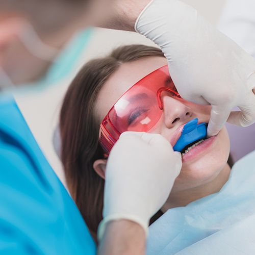 Child receiving fluoride treatment