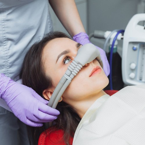 Woman being administered nitrous oxide