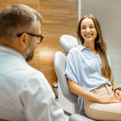 Patient smiling at cosmetic dentist in Lacey