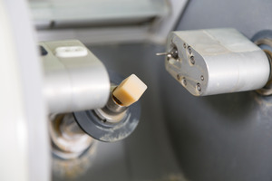 Close-up of ceramic block in CEREC machine
