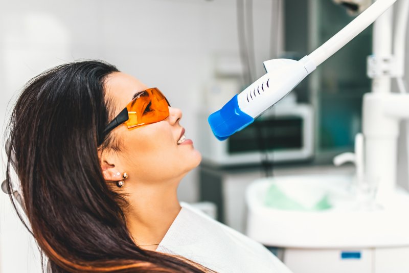 person having teeth whitened