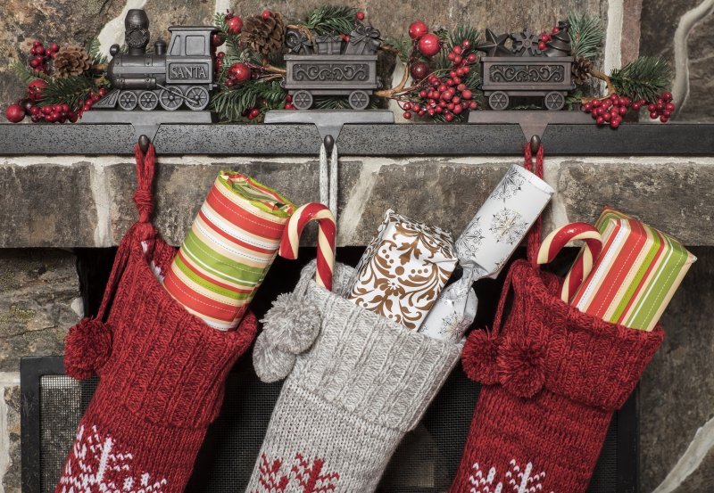 filled stockings hanging off chimney